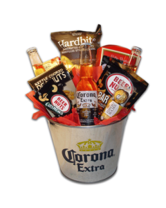 Beer gift basket in a Corona Extra ice bucket with two beers, kettle chips, beer nuts and chocolate bars