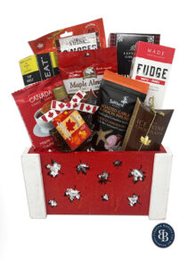 Canadiana gift basket with Canadian gourmet snacks, maple treats and chocolates by Baskets & Beyond Calgary