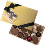 A premium assortment of 16 milk and dark chocolates including rich caramels, smooth creams, soft centers, and crunchy nuts enrobed in chocolate. A little bit of everything, this box makes a perfect choice for any recipient! +$24.99