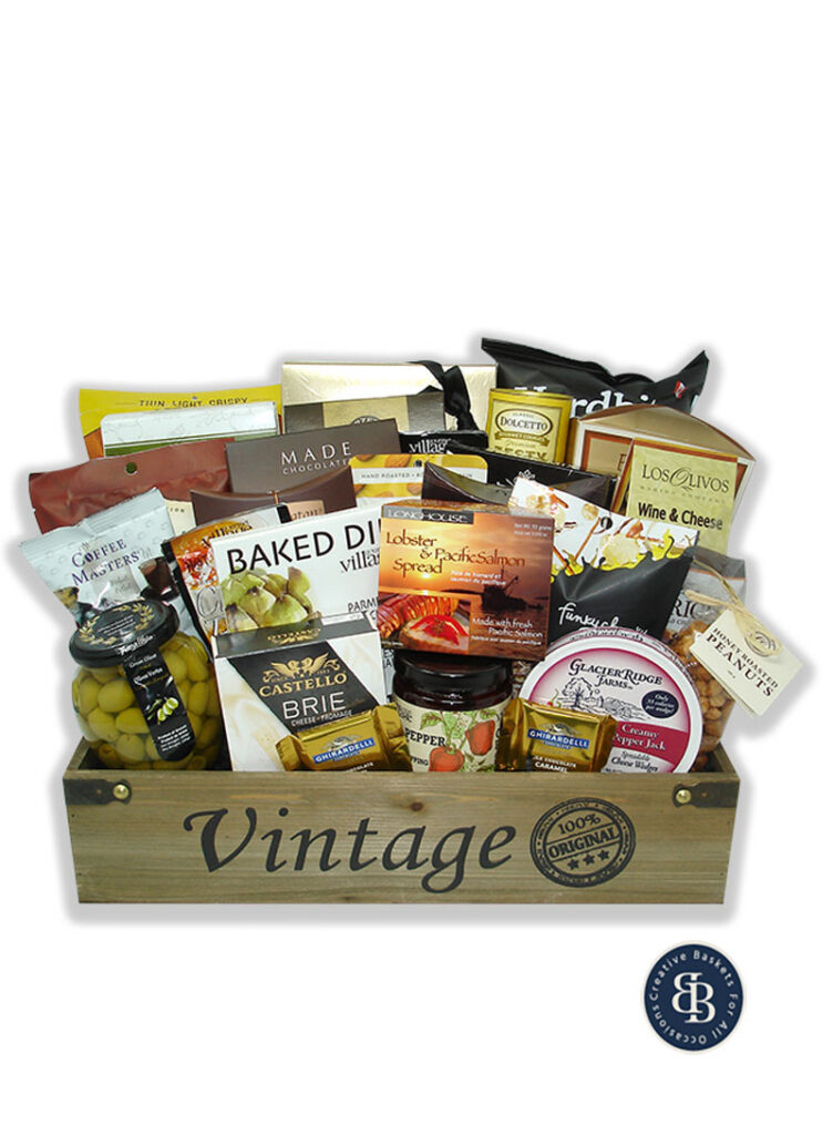 Gourmet gift basket in a wooden Vintage crate with brie, olives, lobster and salmon spread, pepper jelly and Ghirardelli chocolates